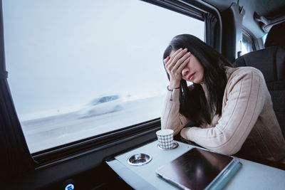 Young woman using mobile phone