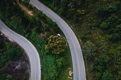High angle view of highway on road amidst trees