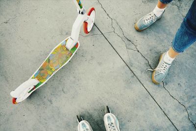 Low section of person standing on skateboard