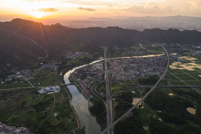 High angle view of landscape against sky during sunset