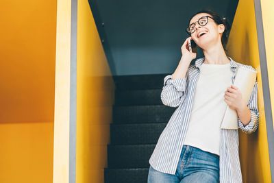 Young woman using mobile phone