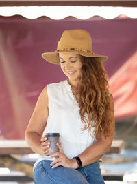 Young woman wearing hat