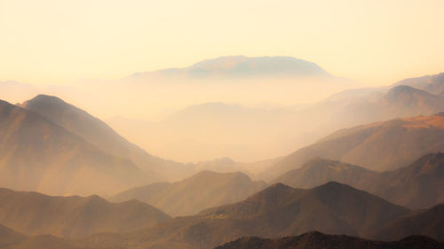 Scenic view of mountains against sky during sunset