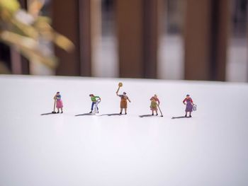 Group of people with toys on floor