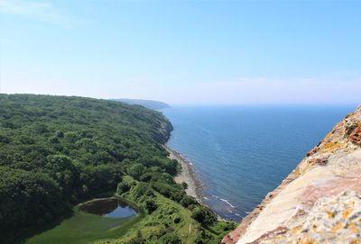 The view over the sea and forest makes your mind sander...