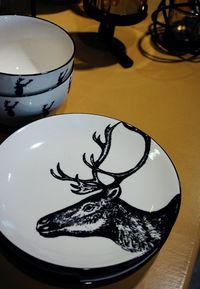 Close-up of coffee cup on table