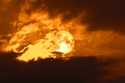 Scenic view of dramatic sky during sunset