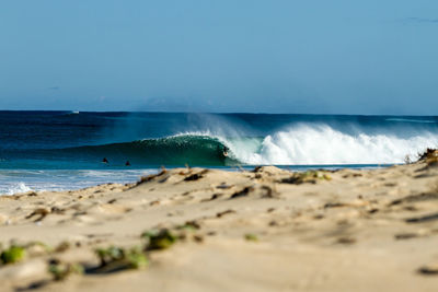 Scenic view of sea against clear sky