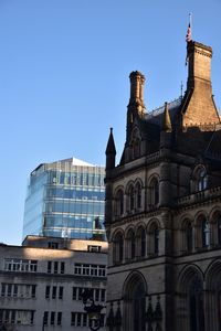 Low angle view of buildings against sky