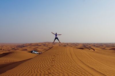 View of desert against clear sky