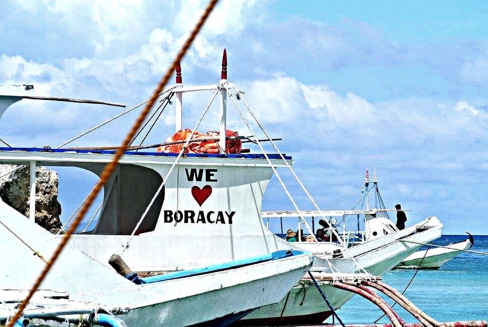 nautical vessel, cloud - sky, day, sky, outdoors, text, no people