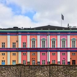 Building against cloudy sky