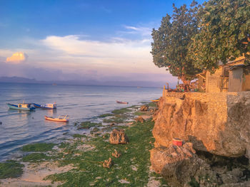 Scenic view of sea against sky during sunset