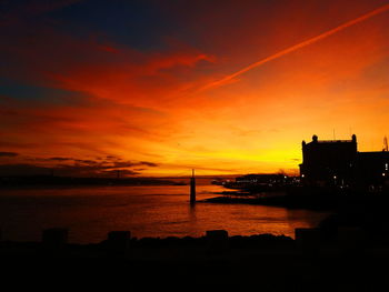 Silhouette of buildings at sunset