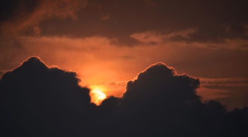 Scenic view of silhouette trees against sky during sunset