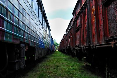 Train on railroad track against sky