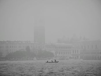 Scenic view of gondola in a foggy day