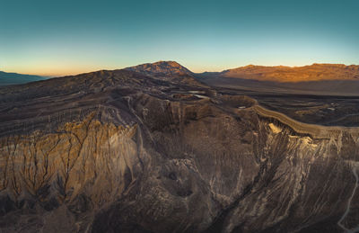 Dramatic volcanic crater landscape in the death valley desert