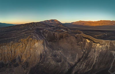 Scenic view of desert against clear sky