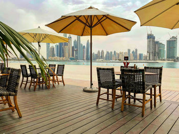 Empty chairs and tables in restaurant