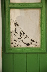 Close-up of old window on building