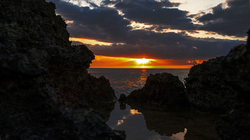 Scenic view of sea against sky during sunset