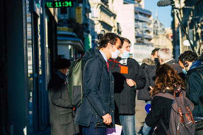 People standing on city street