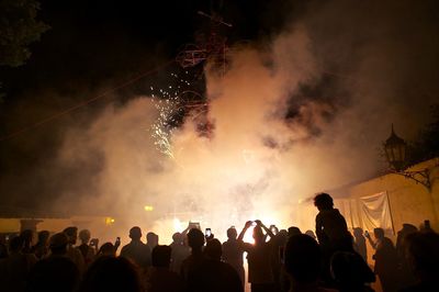 Crowd enjoying festival at night