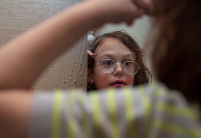 Boy looking in mirror