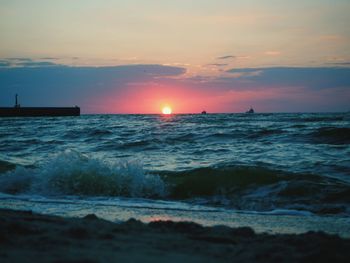 Scenic view of sea against sky during sunset