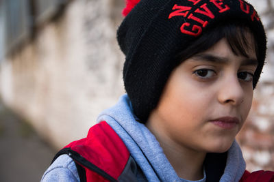 Close-up portrait of boy wearing winter clothing