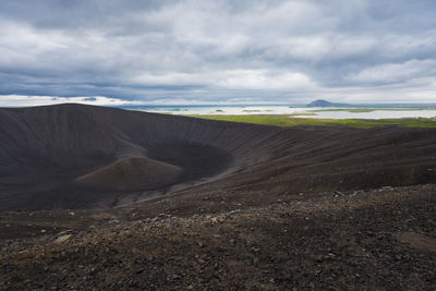 View of the myvatn lake from the rim of hverfjall volcano in northern iceland on a cold, cloudy day.