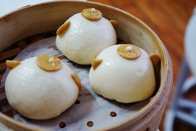 High angle view of eggs in plate on table