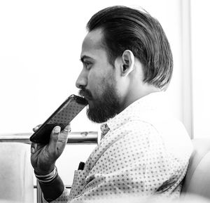 Portrait of young man looking away