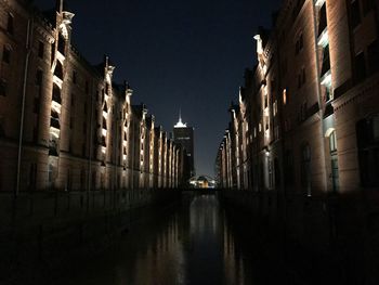 View of illuminated buildings at night