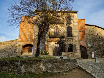 Low angle view of historic building against sky