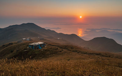 Scenic view of landscape against sky during sunrise, sunset peak in hong kong