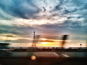 Scenic view of cloudy sky at sunset