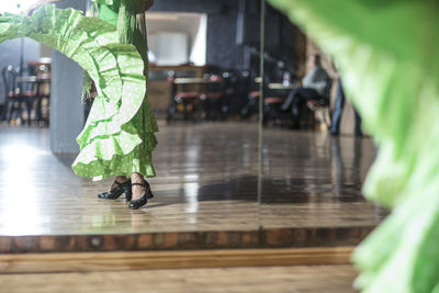 Legs of female latin dancer in studio