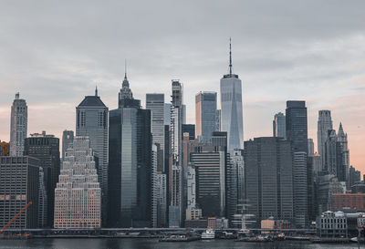 Skyscrapers in city against sky