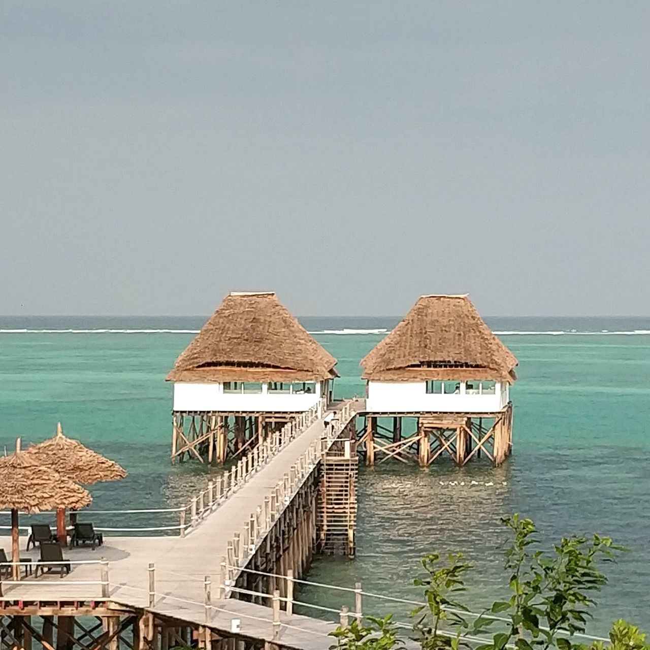 BUILT STRUCTURE ON PIER AGAINST CLEAR SKY