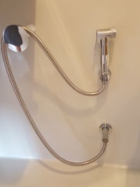 High angle view of electric lamp on wall at home