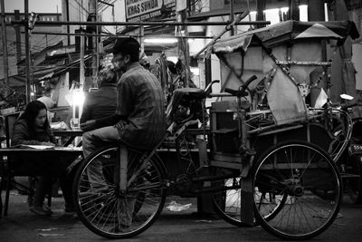 Man riding motorcycle at night