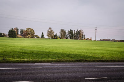 Scenic view of field against clear sky