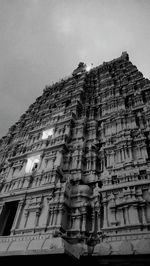 Low angle view of statue against building