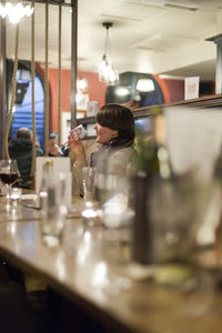 Woman working in glass