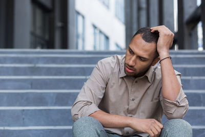 Young man using mobile phone