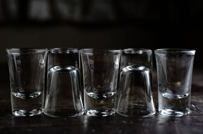 Close-up of glasses on table