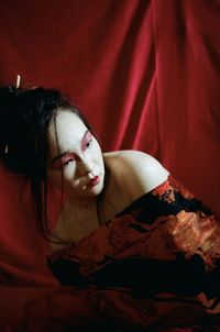 Chinese woman - red background 