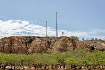 Low angle view of agricultural field against sky